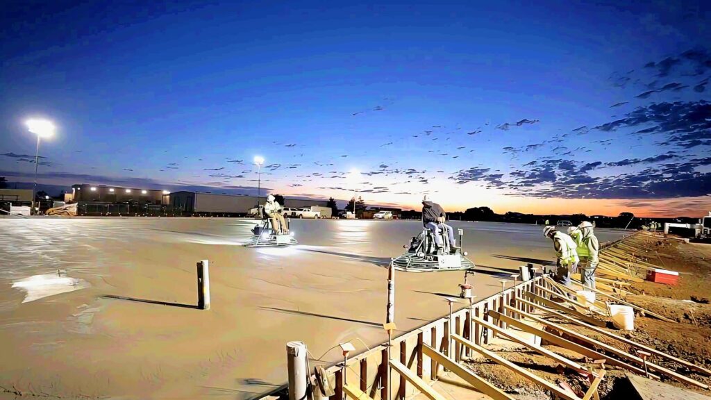 A large concrete slab pour at dawn